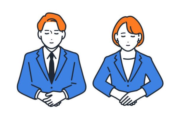 Simple vector illustration of a man and woman in suits bowing.